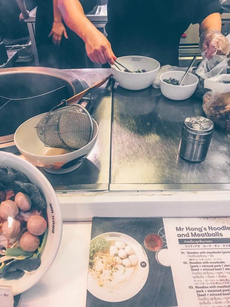 Cooking noodles and meatballs in the Emporium